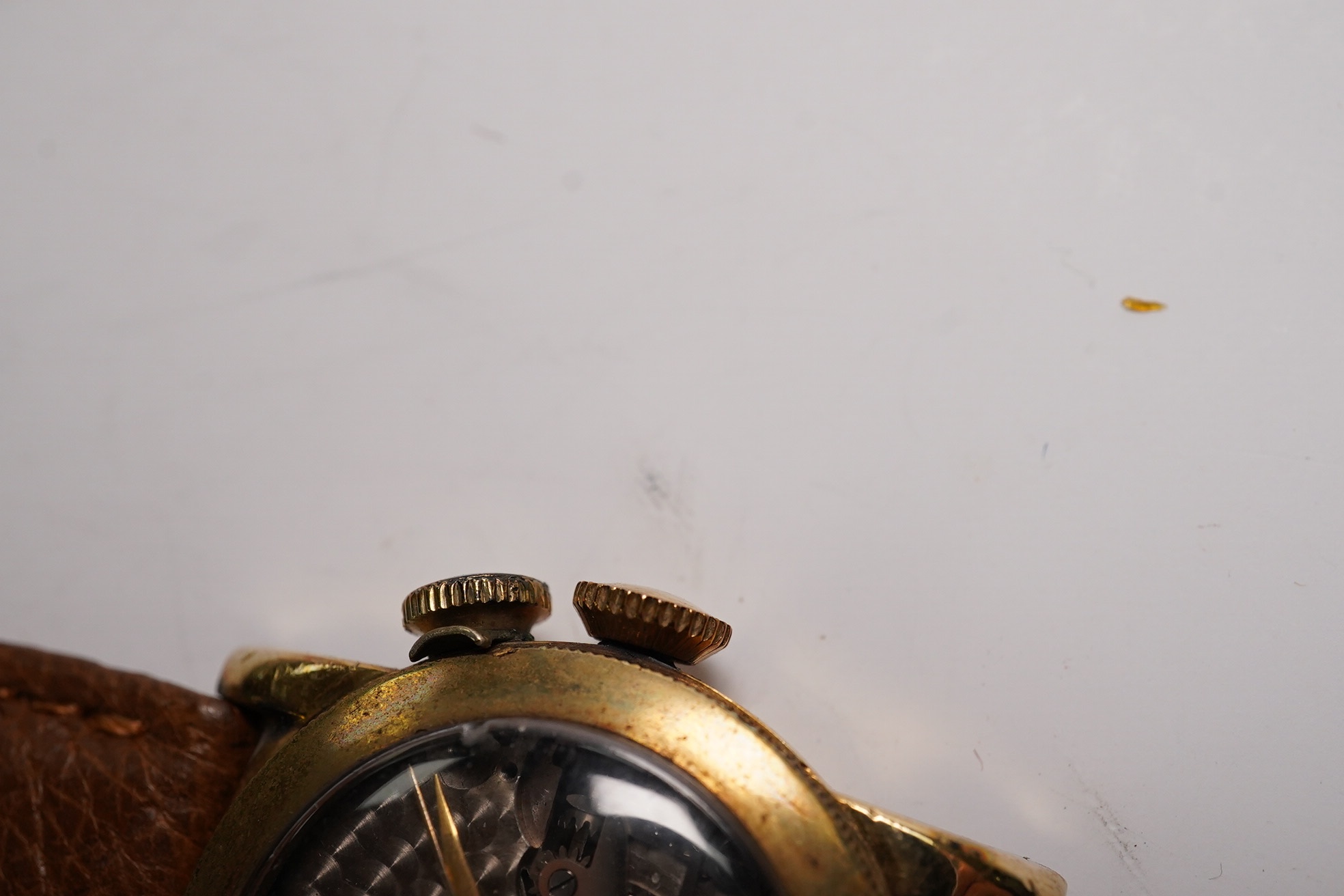 A gentleman's 1940's 10k gold filled Longines Weems? manual wind wrist watch, lacking dial, case diameter 28mm, together with a lady's silver wrist watch. Condition - poor to fair